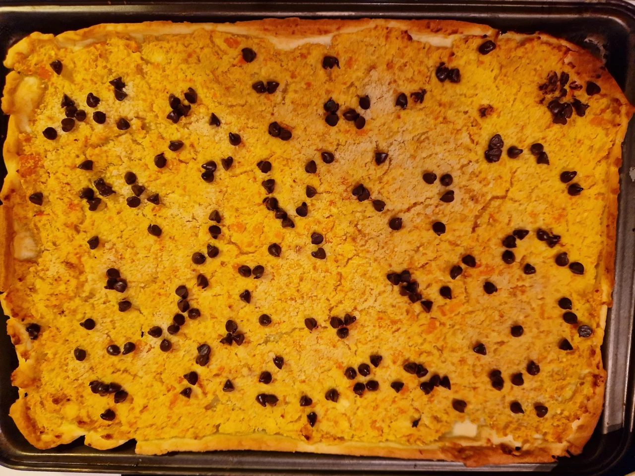 Tarte a la pulpe d'ecorces d'oranges & mandarines confites et pepites de chocolat